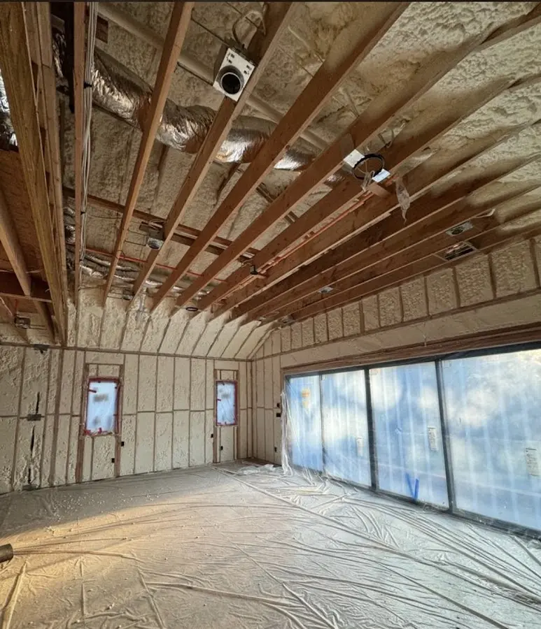 Interior walls and ceiling insulated with spray foam during new construction in Tuba City